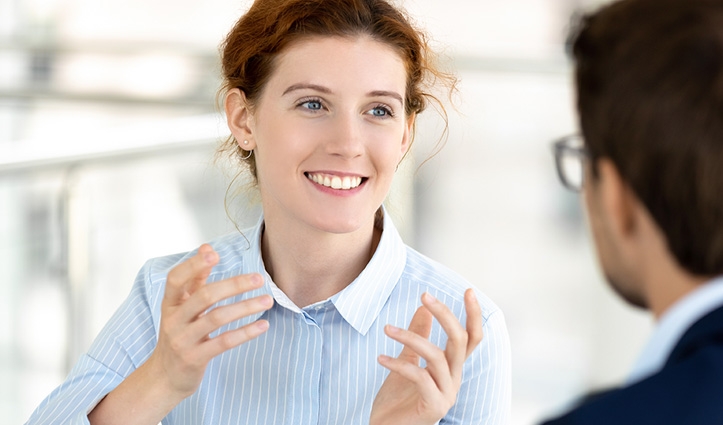 a woman explaining work to a colleague
